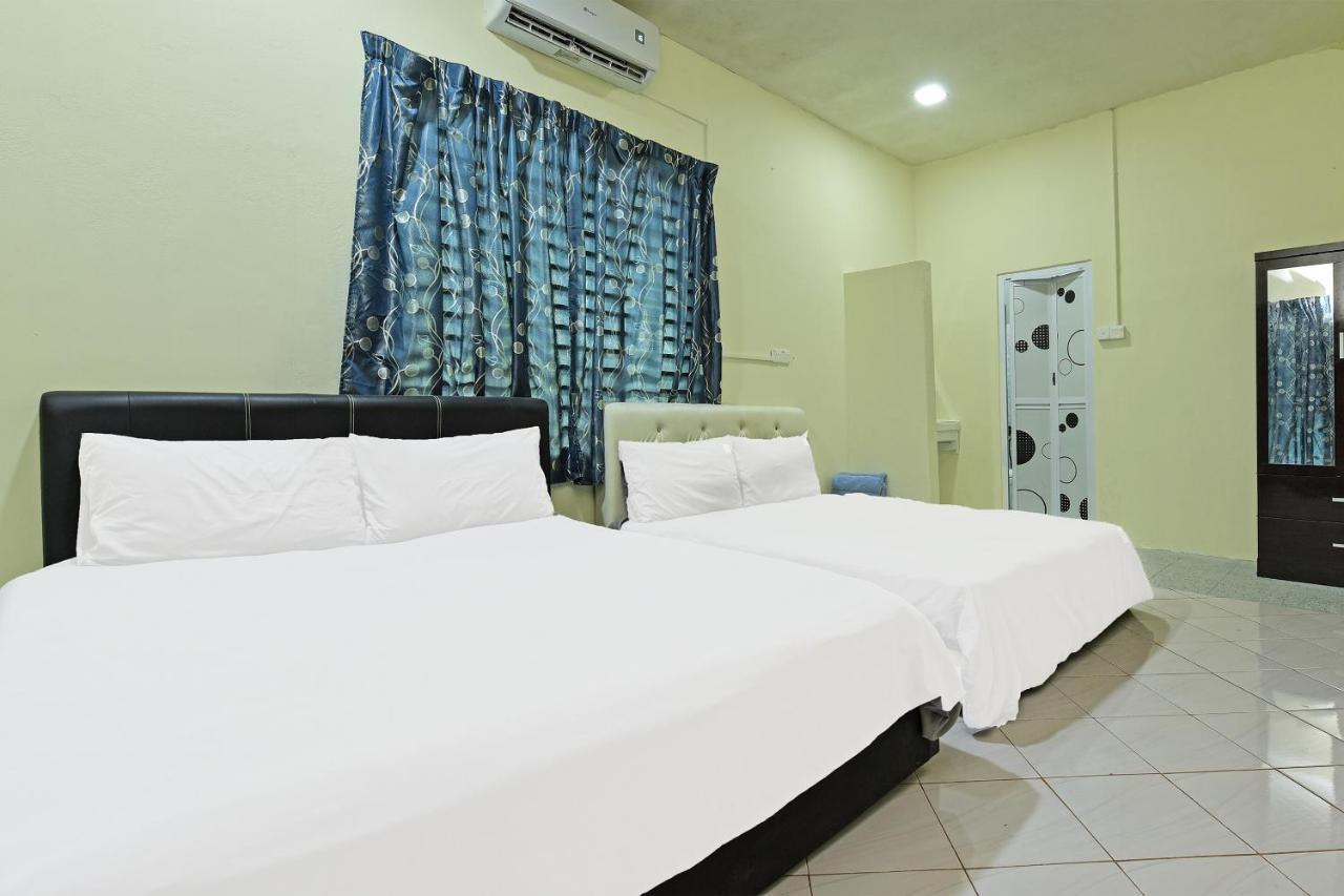 Oyo 90596 Casaria Inn Paka Extérieur photo