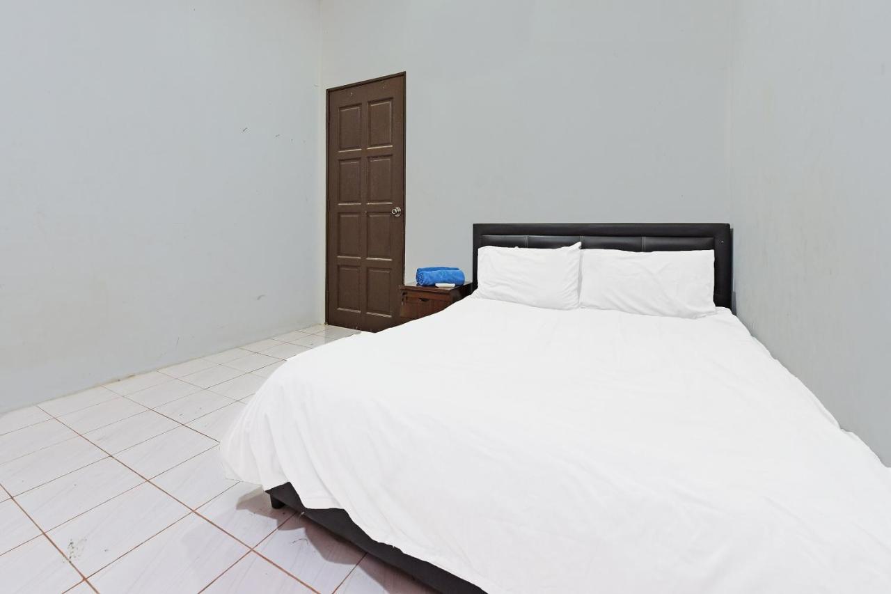 Oyo 90596 Casaria Inn Paka Extérieur photo