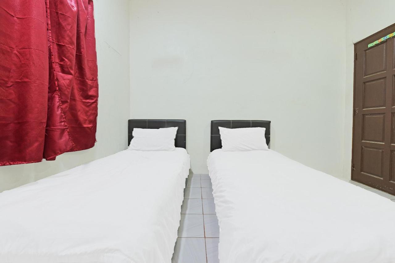 Oyo 90596 Casaria Inn Paka Extérieur photo